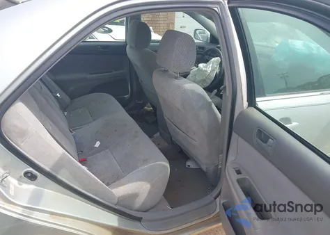 2003 Toyota Camry Le from USA, damaged, VIN 4T1BE32KX3U144402